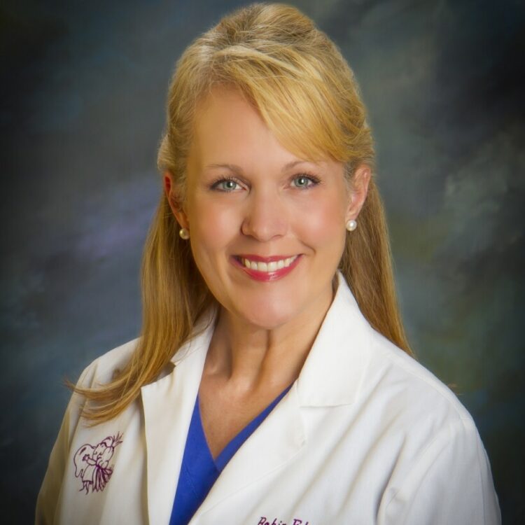 a portrait of Dr. Robin Edwards, who previously owned the Affordable Dentures and Implants in Kinston, NC